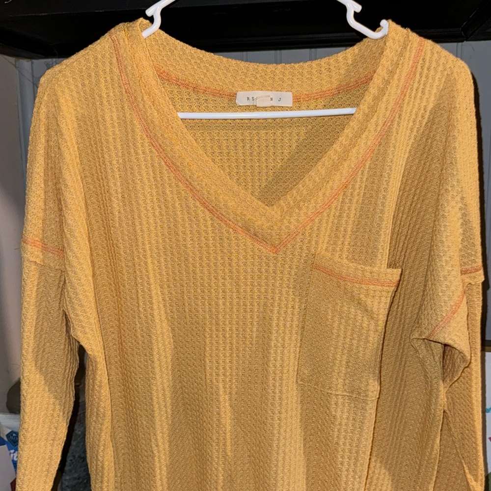Reborn size small yellow waffle top. Never worn.